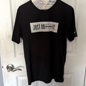 The Nike dry fit tee shirt, men’s size medium. Just Don’t Quit